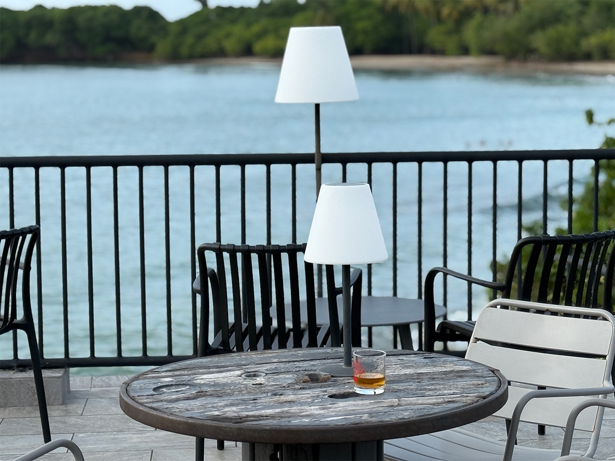 The Caribbean’s Best New Rooftop Bar Sits Above a 150-Year-Old Beachfront Rum Distillery 